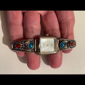 Vintage Navajo watch with turquoise and coral stones.